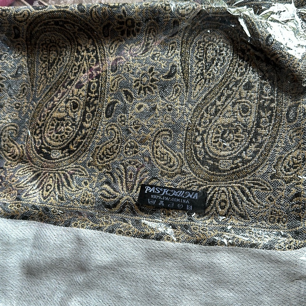 Pashmina wrap, silver grey with golden paisley patterned bands. New in package